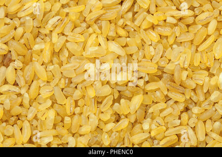 Bulgur, secco chicchi di grano, sfondo Foto Stock