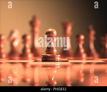 La pedina di evidenziare. Pezzi di gioco di scacchi, immagine con profondità di campo ridotta. Foto Stock