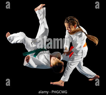 Bambini arti marziali fighters isolato Foto Stock