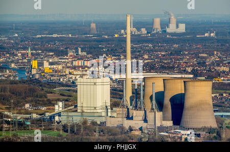 Vista di Hamm con il Gersteinwerk impianto alimentato a carbone nella parte anteriore e il Westfalen impianto di alimentazione sulla parte posteriore all'orizzonte con un estremo telefono Foto Stock