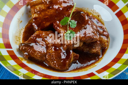 Vino rosso caramellato pancetta di maiale Foto Stock