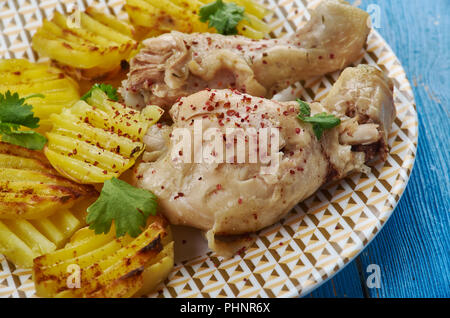 Soffocato le cosce di pollo Foto Stock