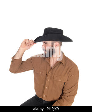 Bel Uomo in camicia marrone e nero cappello da cowboy Foto Stock