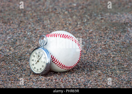 Nuovo baseball con un vecchio sport cronometro Foto Stock