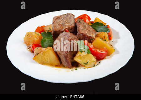 Carne arrosto con patate Foto Stock