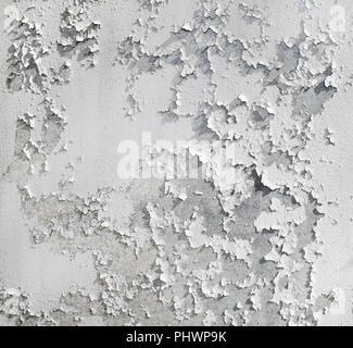Il vecchio muro rotto con peeling bianco paint texture. Grunge background. Foto Stock