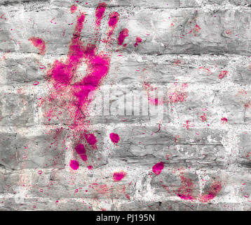 Rosa handprint sul muro di pietra. Ideale per il tuo background creativo. Foto Stock