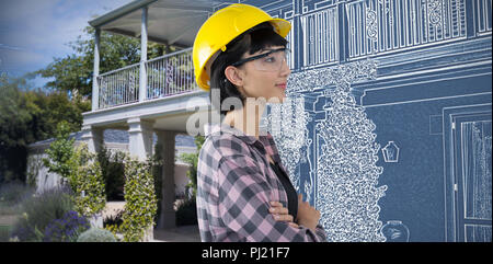 Immagine composita di architetto femmina in piedi con le braccia incrociate contro uno sfondo bianco Foto Stock