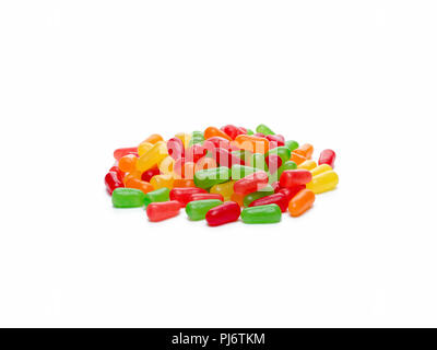 Palo isolata di colorate a forma di pillola aromatizzate alla frutta candy Foto Stock