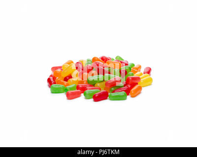 Palo isolata di colorate a forma di pillola aromatizzate alla frutta candy Foto Stock
