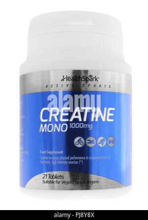 Barattolo di creatina compresse mono su sfondo bianco Foto Stock