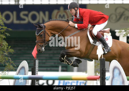 Il Masters 2004, ENCANA Cup, Ian Millar (CAN) riding nello stile Foto Stock