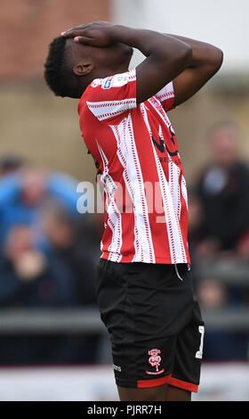 Lincoln City's Bernard Mensah sorge sconsolato durante il campionato Skybet due corrispondono a Sincil Bank Stadium, Lincoln. Foto Stock