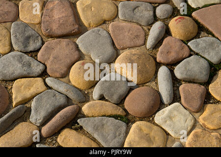 Marciapiede in pietra pattern texture close-up immagine di sfondo. Foto Stock