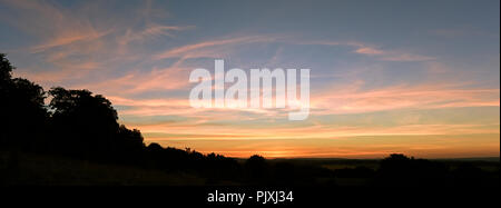 Tramonto da Danebury Hillfort in Hampshire, Inghilterra Foto Stock