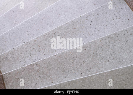 Scale terrazzo in pietra levigata la passerella e il pavimento, il motivo e il colore superficie di marmo e di granito, materiale per decorazione texture di sfondo, inte Foto Stock