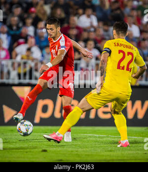 FK Partizan Stadium, Belgrado, Serbia. Decimo Sep, 2018. La UEFA Nazioni League Football, Serbia contro la Romania; Dusan Tadic di Serbia in azione contro Cristian Sapunaru della Romania di credito: Azione Sport Plus/Alamy Live News Foto Stock