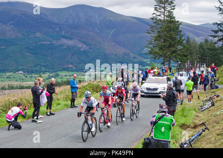 Fase 6, tour della Gran Bretagna 2018, 7 settembre. Breakaway sulla prima ascesa di Whinlatter Pass, Vasil Kiryienko: Tony Martin, James Shaw e Connor Swift. Foto Stock