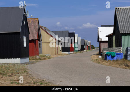 Al vecchio porto da pesca 'Ae Gammel Havn' in Hvide Sande, Danimarca, è stato costruire cabine per le vacanze. In origine vi erano le cabine per la memorizzazione dei pescatori Foto Stock