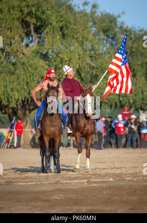 Il lago di Issyk-Kul, Kirghizistan, 5 Settembre 2018: american nomad tenetevi pronti per il wrestling a cavallo Foto Stock