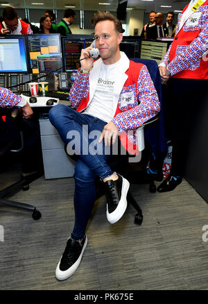 Olly Murs frequentando il XIV BGC annuale Giornata della Carità a Canary Wharf a Londra, in commemorazione del BGC's 658 colleghi e i 61 dipendenti Eurobrokers perso su 9/11. Stampa foto di associazione. Picture Data: martedì 11 settembre, 2018. Vedere PA storia SHOWBIZ carità. Foto di credito dovrebbe leggere: Ian West/PA FILO Foto Stock