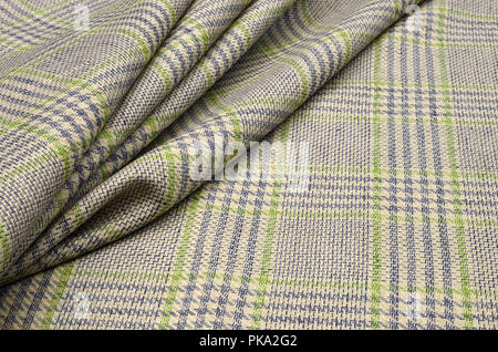 Stoffa di cotone, lino e elastan colore blu-verde sulla luce beige, costume Foto Stock