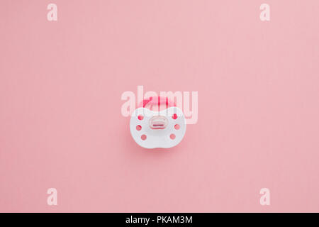 Baby silicone succhietto di colore rosa Foto Stock