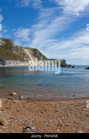 Uomo O'guerra spiaggia sabbiosa di Dorset Foto Stock