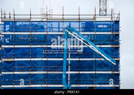 Gosford, Nuovo Galles del Sud, Australia - 3 settembre. 2018: costruzione e costruzione di aggiornamento progressi 127. Erogazione di calcestruzzo sulla nuova unità abitative edificio Foto Stock