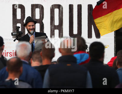 Chemnitz, in Sassonia. Xiv Sep, 2018. 14 settembre 2018, Germania, Chemnitz: Martin Kohlmann di Pro Chemnitz parla di una dimostrazione della destra populista movimento Pro di Chemnitz. Credito: ---/dpa/Alamy Live News Foto Stock