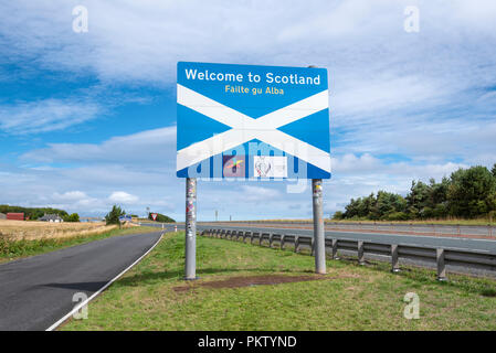 Frontiera scozzese segno all'Associazione anglo-scozzese di frontiera, vicino Lamberton, Scotland, Regno Unito Foto Stock