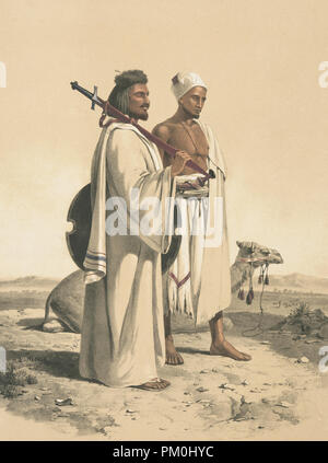 Gli arabi e i cammelli nel deserto Foto Stock