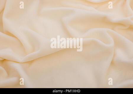 Texture astratta di un morbido Tess. Crema naturale tessuto sfondo. Foto Stock