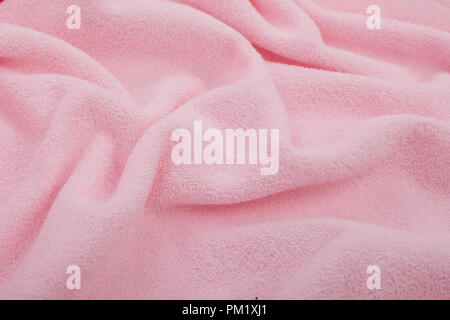 Pagina completa chiusura del tessuto rosa texture. Rosa, tessuto morbido texture di sfondo. Foto Stock