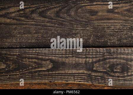 Il vecchio legno marrone texture. Il vecchio grunge textured scuro dello sfondo di legno. Foto Stock
