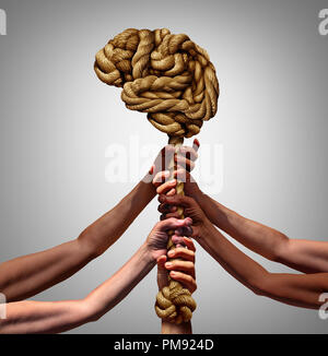 La psicologia e la società del gruppo salute mentale concetto di supporto come diverse persone che trattengono il supporto di una fune conformata come un organo di pensiero Foto Stock
