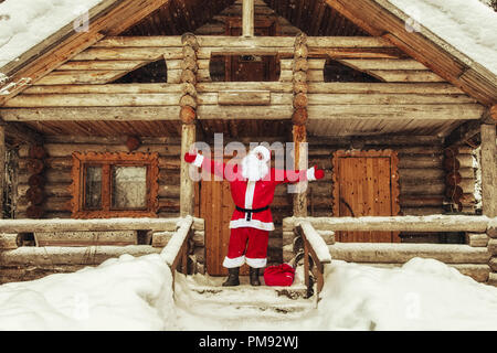 Gioiosa Santa Claus in casa sua. La casa di Babbo Natale al Polo Nord. Foto Stock