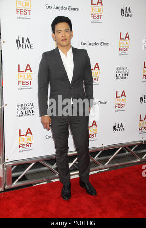 John Cho 06/11/2014 XX anniversario di Los Angeles Film Festival apertura notturna il North American Premiere di 'Snowpiercer" tenutasi presso il Regal Cinemas L.A. Live Stadium 14 a Los Angeles, CA Foto di Izumi Hasegawa / HNW / PictureLux Foto Stock