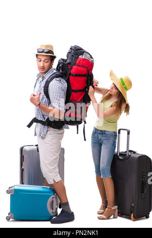 Giovane famiglia preparando per andare in vacanza su bianco Foto Stock