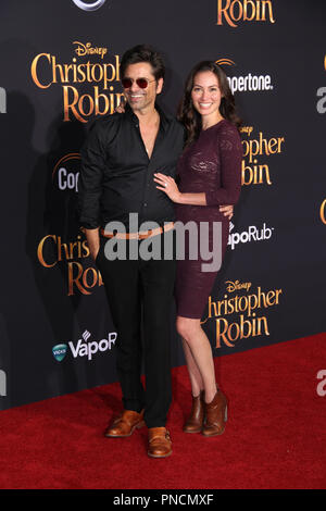 John Stamos e Caitlin McHugh presso il Disney's Premiere mondiale di "Christopher Robin'. Tenuto presso il Walt Disney Studios teatro principale di Burbank, CA, 30 luglio 2018. Foto: Richard Chavez / PictureLux Foto Stock