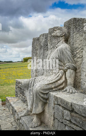 La scultura conosciuta come 'Tolpuddle sei", essendo i martiri Tolpuddle caratteristiche George Loveless fissando il cielo nella disperazione. Foto Stock