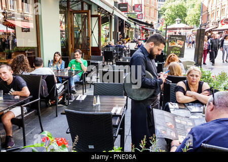 London England,UK Leicester Square,Steak & Co.,ristorante ristoranti cibo pranzo caffè, al fresco, marciapiede fuori tavoli ristoranti strada caffè, dini Foto Stock