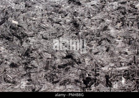 Primo piano immagine che mostra la struttura di pannello truciolare verniciato nero Foto Stock