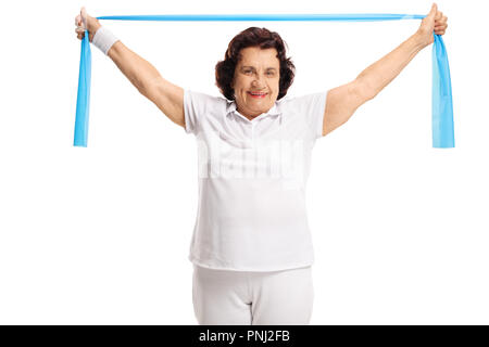 Donna anziana che lavora fuori con un nastro di gomma isolati su sfondo bianco Foto Stock