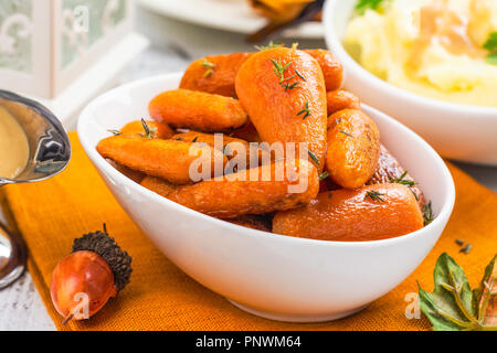 Arrosto di carotine al timo Foto Stock