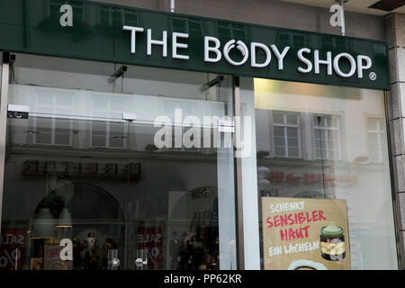 Un segno del logo al di fuori di un corpo Shop Store a Monaco di Baviera, Germania, il 2 settembre 2018. Foto Stock