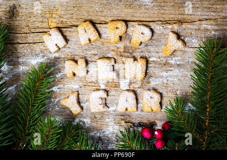 Felice anno nuovo nota scritta con le lettere dei cookie Foto Stock