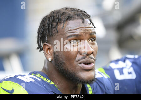 Seattle, Washington, Stati Uniti d'America. 23 Sep, 2018. Seattle Frank Clark (55) sugli spalti come Dallas Cowboys riprodurre i Seattle Seahawks in un gioco di NFL al secolo campo Collegamento a Seattle, WA. Credito: Jeff Halstead/ZUMA filo/Alamy Live News Foto Stock