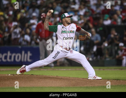 Héctor Velázquez lanciatore de Mexico, duranti el partido final de la Serie del Caribe en el Nuevo Estadio de los Tomateros en Minatitlan, Messico, Martes Foto Stock