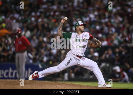 Héctor Velázquez lanciatore de Mexico, duranti el partido final de la Serie del Caribe en el Nuevo Estadio de los Tomateros en Minatitlan, Messico, Martes Foto Stock